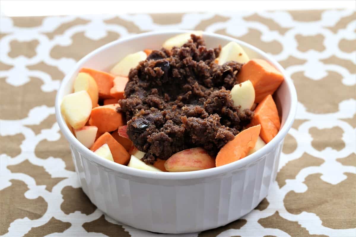 sweet potatoes and apple with spices in bowl